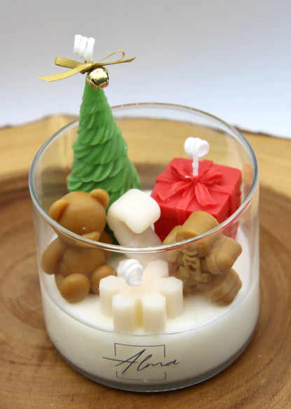 Festive handmade candle with toy-themed design – Christmas soy wax decor – Alma Gift Front