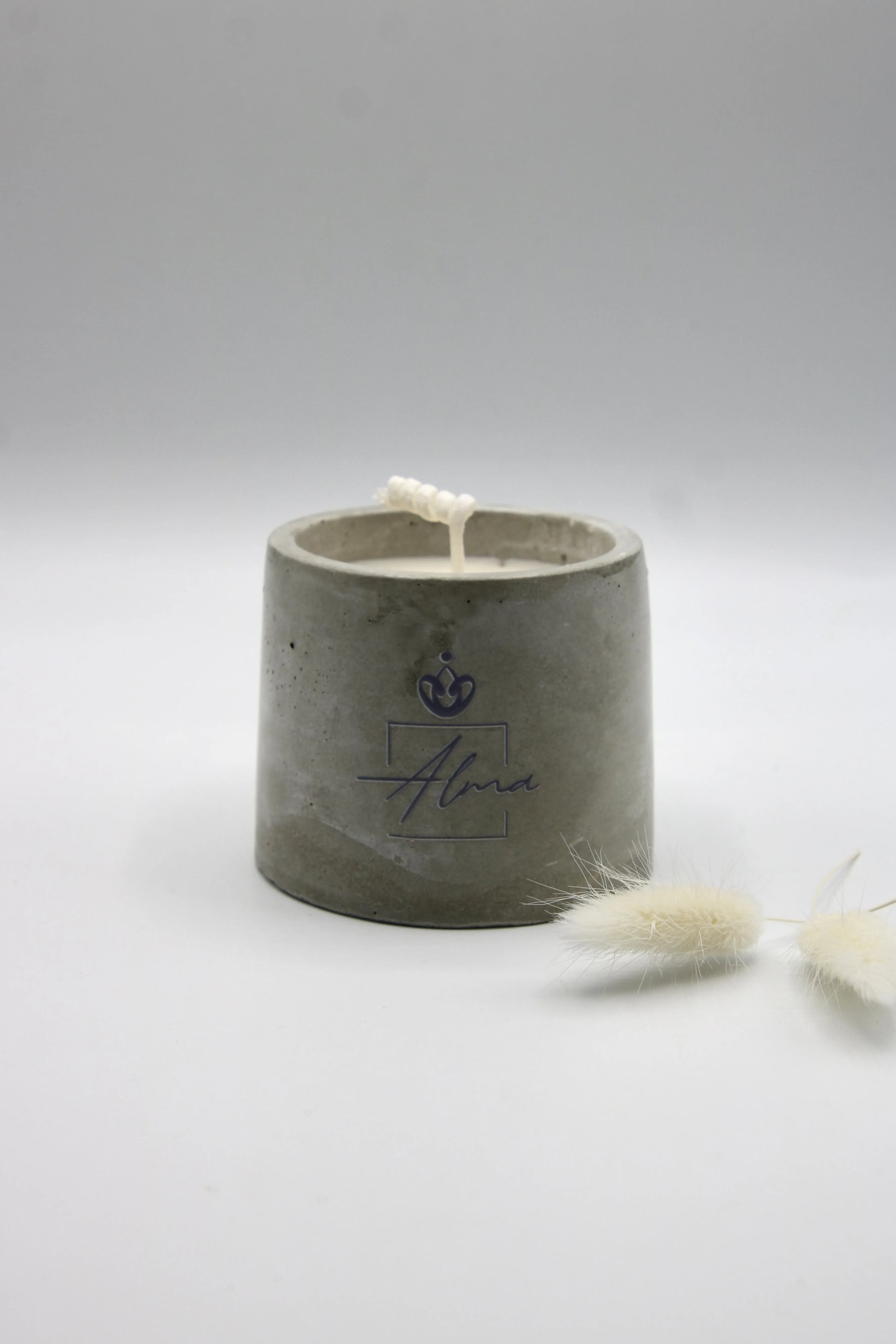 Alma Gift handmade soy candle in cylindrical concrete vase, front view, Miami Beach