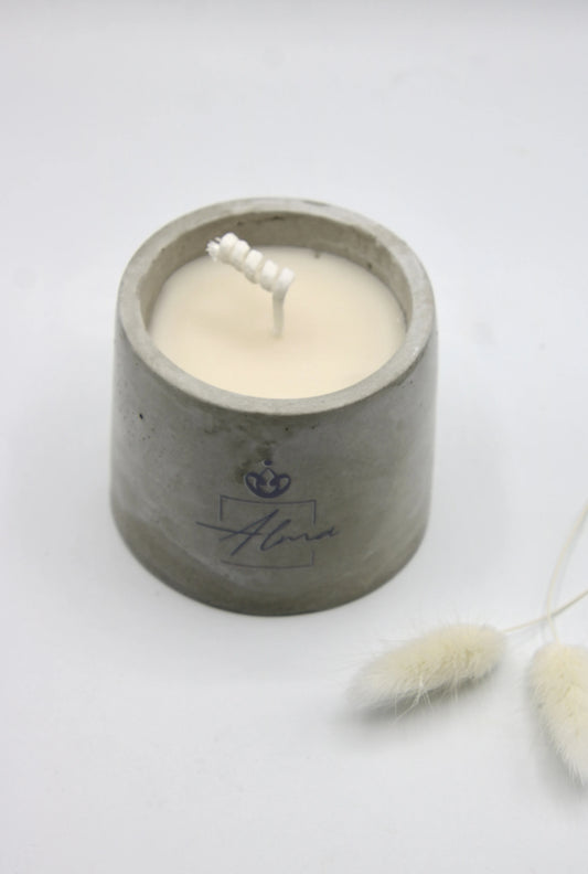 Alma Gift handmade soy candle in cylindrical concrete vase, top view, Miami Beach