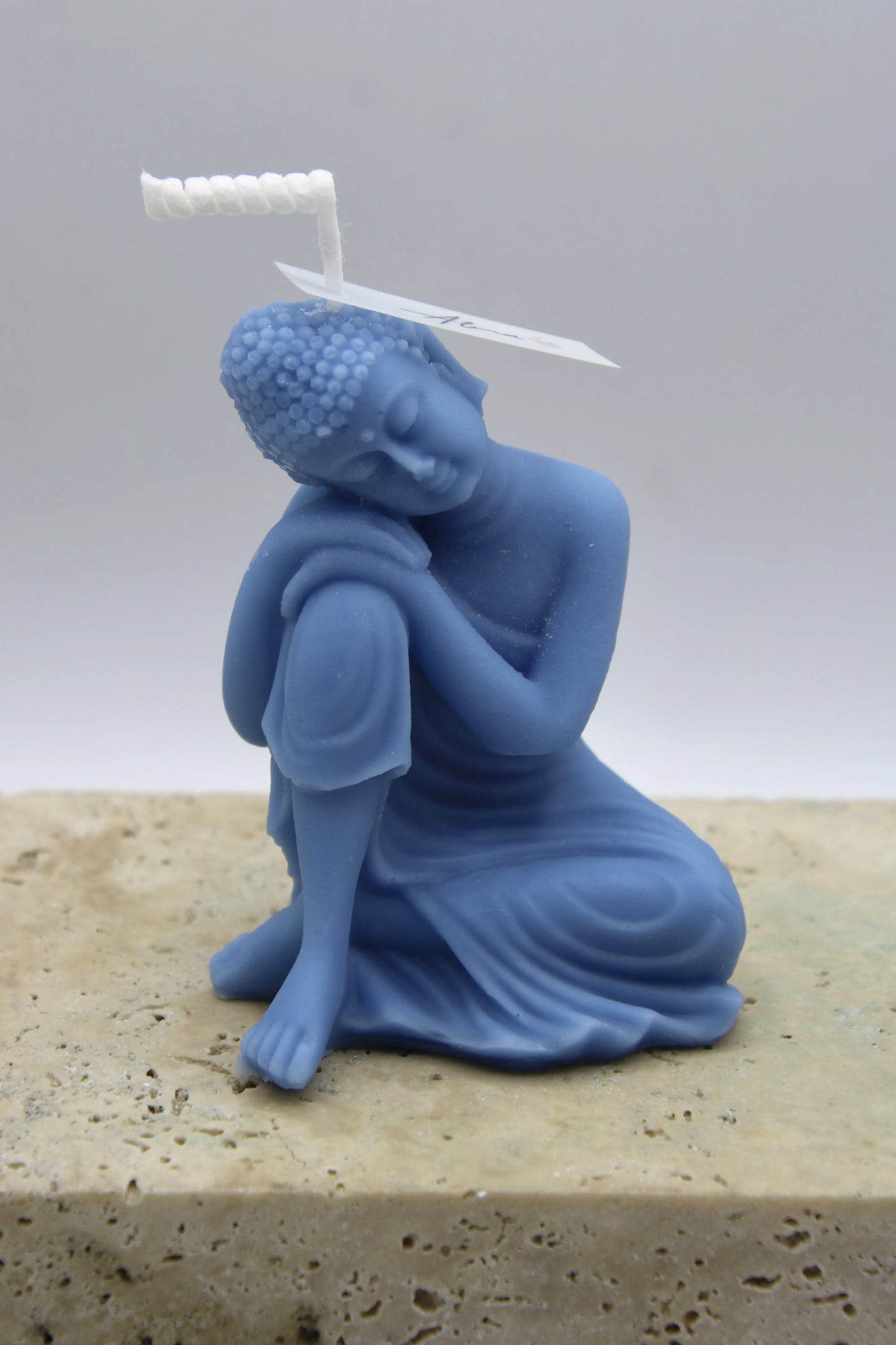 Alma Gift Dreamer Buddha handmade blue candle sculpture on marble base, Miami Beach
