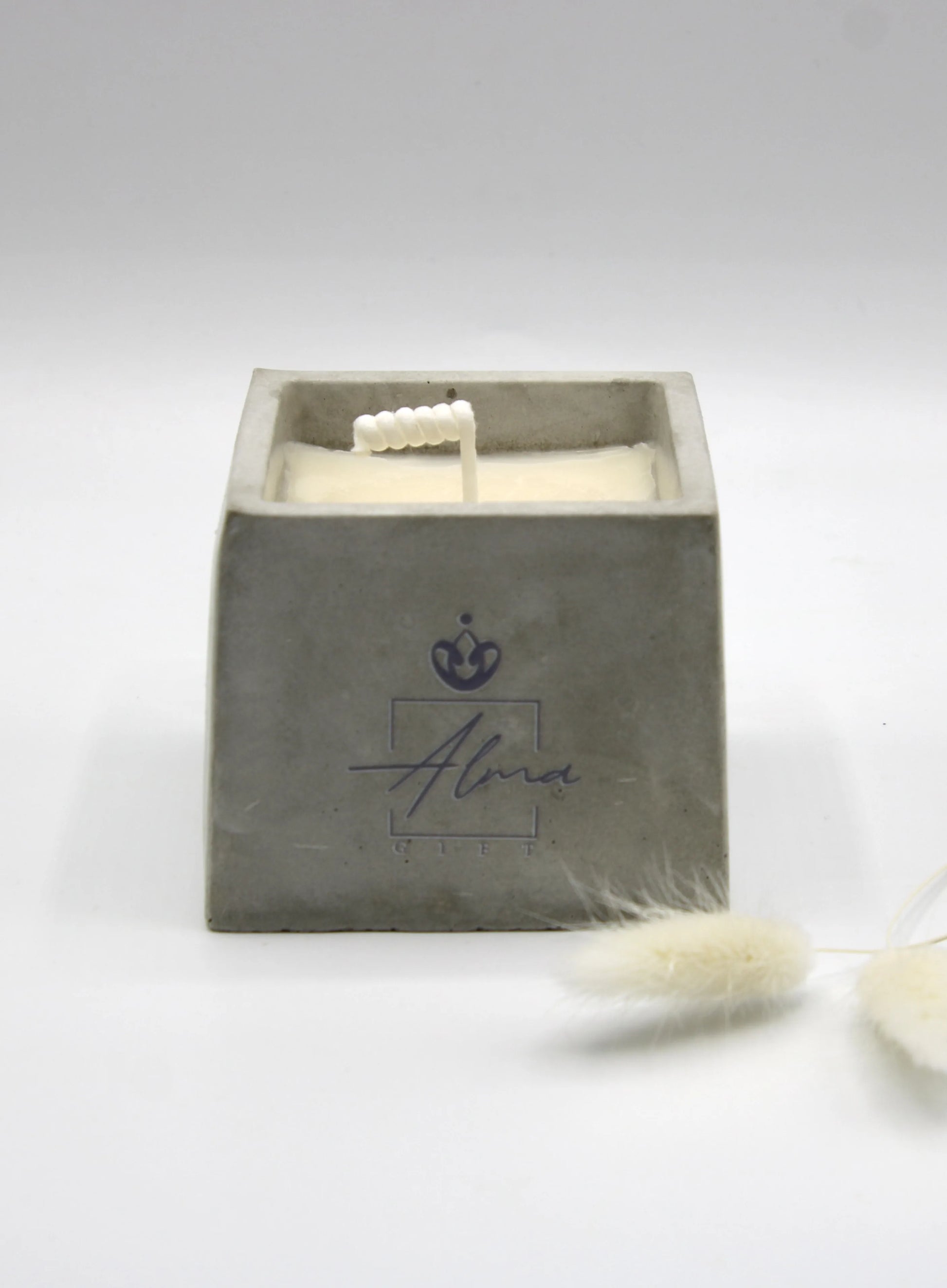 Alma Gift handmade soy candle in square concrete vase, front view, Miami Beach
