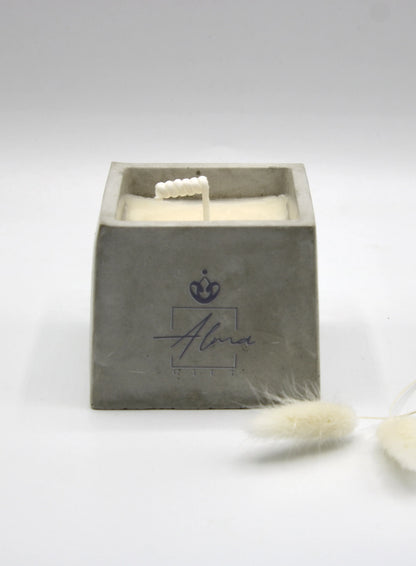 Alma Gift handmade soy candle in square concrete vase, front view, Miami Beach