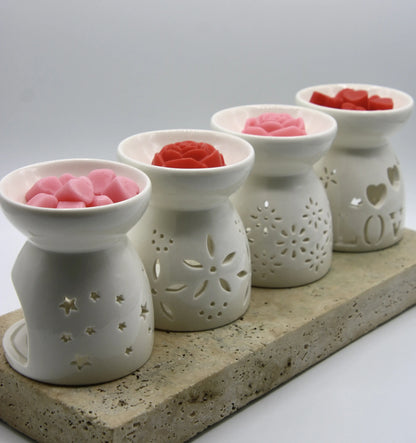 set of four ceramic wax warmers with wax melts hearts and rose decorative home fragrance