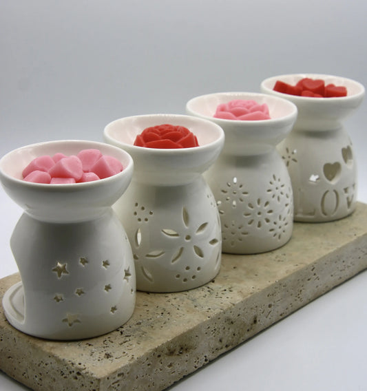 set of four ceramic wax warmers with wax melts hearts and rose decorative home fragrance