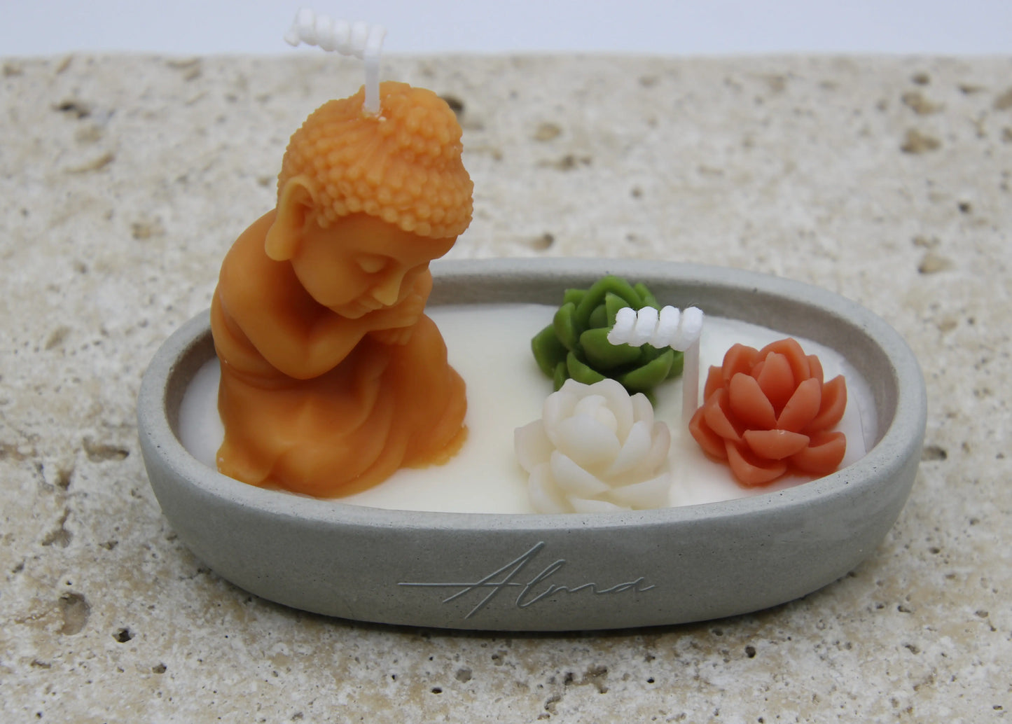 top view zen candle with buddha and flower elements handmade decorative candle
